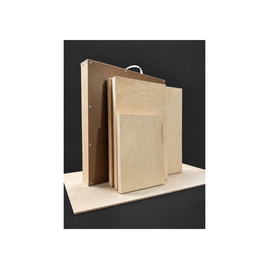 Reusable wooden shipping box with birch wood art panels displayed in front, handmade by Vermont Art Panels for safe transport and storage.